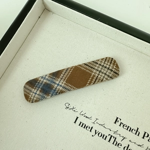 British style plaid rectangular hair clip with vintage brown check texture on canvas box