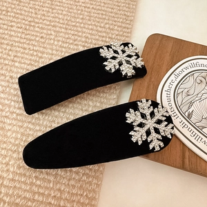 Elegant black velvet hair clips with rhinestone snowflakes and rectangular drop shapes