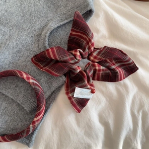 Red plaid hair accessories set including a bunny ear scrunchie and a matching headband