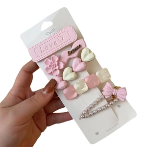 Lot de 5 barrettes à cheveux roses et crème avec cœurs et fleurs sur carte de support