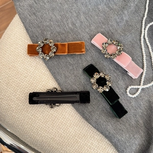 Vintage velvet bow hair clips set with rhinestone circles in four elegant colors