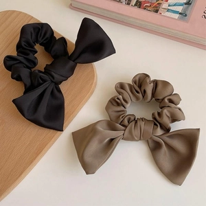 Elegant satin bow hair scrunchies set in black and coffee brown for stylish hair styling
