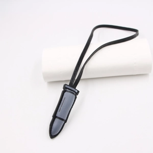Gray and black bullet-shaped leather keychain with rope and harnessmeister.online text