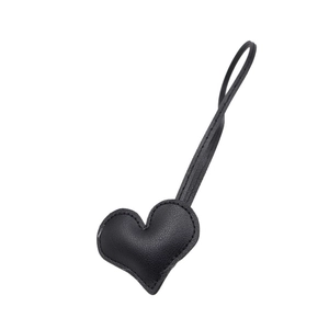 Litchi pattern black leather heart charm with matching stitching and leather cord