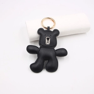 Handmade embroidered black leather bear charm with golden spring ring for bags