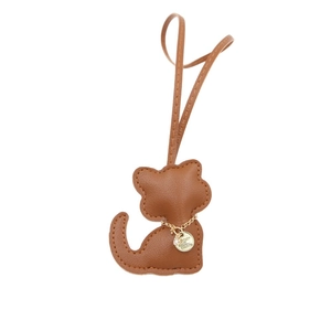 Brown leather cat keychain charm with gold chain necklace and sparkling rhinestone pendant