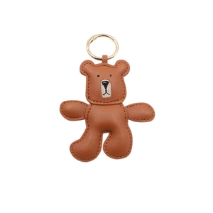 Brown handmade faux leather teddy bear keychain with gold ring and embroidered face details