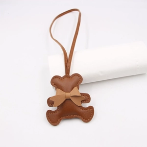 Cute brown leather bear keychain with bow and lanyard for bags and accessories