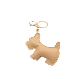 Litchi pattern leather dog keychain with gold hardware on white background