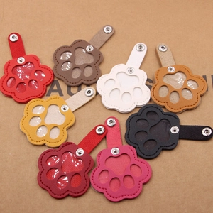 Portable leather cat paw keychain bag and pet hair collector in eight vibrant colors