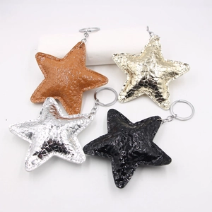 Star shaped leather keychains with snake skin texture in four colors and metallic rings