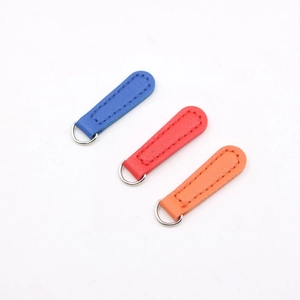 Detail of colorful PU leather zipper pulls with metallic D-rings for DIY phone cases