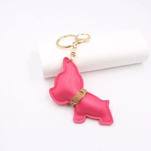 Detailed view of rose red leather bulldog keychain with gold lobster clasp and ring
