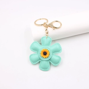 Mint green sunflower leather keychain with golden ring for phone cases and bags