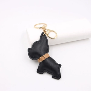 French Bulldog leather keychain with black lychee texture and gold lobster clasp hardware