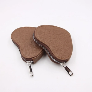 Mini heart-shaped brown lychee leather coin purse with silver zipper closure