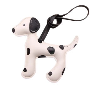Charm de sac chic en cuir motif dalmatien avec cordon noir et coutures contrastées
