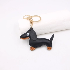 Cute black and tan leather dachshund dog keychain with gold metal clasp for handbags