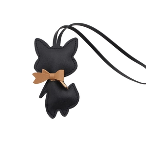 Creative black leather fox charm with brown bowtie and hanging strap for bags