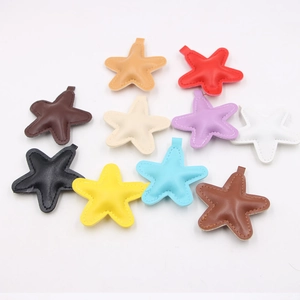 Detailed close-up showing stitched colorful padded leather star patches for DIY accessories