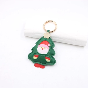 Christmas tree leather keychain with Santa Claus pattern and gold metal clasp accessory