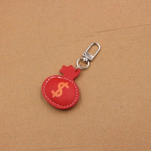 Red leather money bag keychain with dollar sign and silver metal clasp for handbags