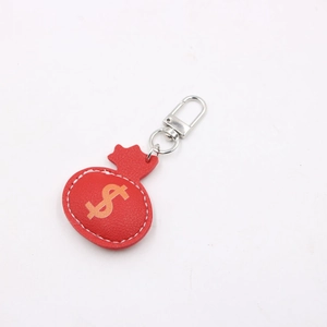 Red leather money bag keychain with gold dollar sign and silver metal spring hook