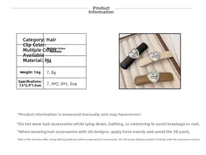 Detail view of high-quality PU leather hair clips with engraved metal heart decorations