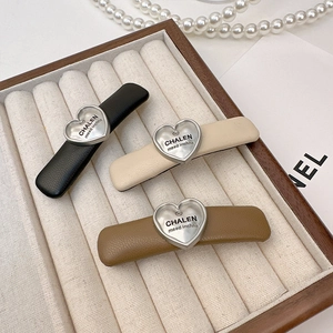 Three-piece set of heart-shaped PU leather hair clips in black, beige and coffee brown