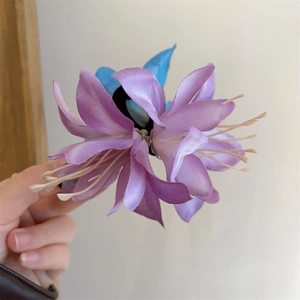 Elegant purple lily flower hair claw clip with realistic silk petals for women