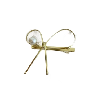 Barrette à cheveux nœud en métal doré avec perle blanche et strass brillants