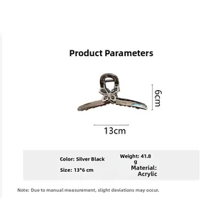 Vue détaillée de la pince à cheveux papillon strass avec dimensions 13x6cm et spécifications