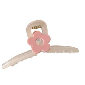 Pince à cheveux élégante effet gelée avec fleur rose sur fond blanc pur