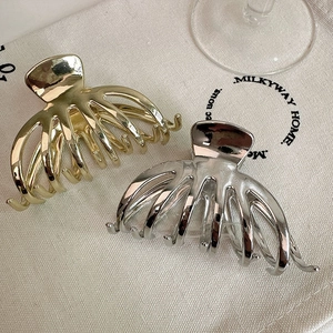 Minimalist large metal shark hair clips in polished gold and silver finish for women