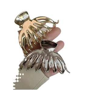 Minimalist octopus claw metal hair clips in shiny gold and silver finish for women