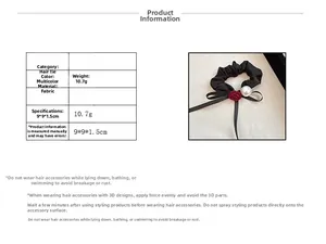 Detail showing red rose hair tie with white pearl decoration and specific product dimensions