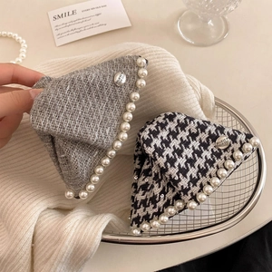 Elegant tweed and houndstooth claw clips with white pearl trim and metal emblem