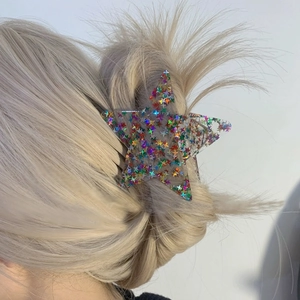 Y2K style star-shaped transparent hair claw clip with colorful sequins for women