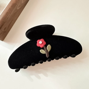 Elegant black flocked hair claw with red flower embroidery and pearl detail for women