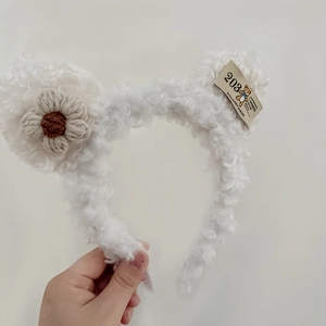 Cute white plush bear ear headband with crochet flower and vintage woven label