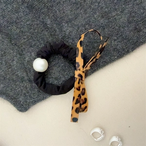 Leopard print bow hair tie with pearl decoration and silver loop earrings set