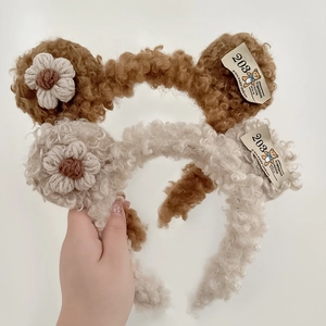 Cute plush bear headbands in brown and beige with floral details for autumn winter styling
