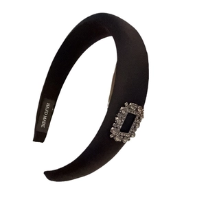 Padded black velvet headband with elegant rectangular rhinestones and handmade label