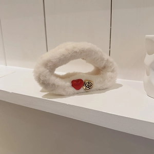 Faux fur hair claw clip in creamy white with red heart and gold camellia flower detail