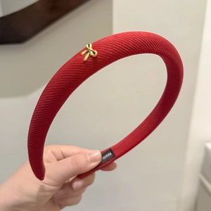 Red twill fabric headband with gold butterfly metal charm for stylish hair styling