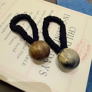Chic two-piece elastic hair tie set with amber and marble textured resin spherical beads