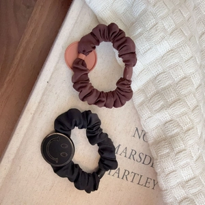 Vintage forest style scrunchies set in dark brown and black with smiley face metal charm