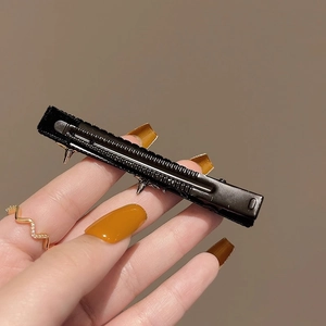 Elegant black metal star hair clip with fabric wrap for daily minimalist styling