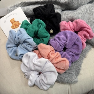 7-piece colorful scrunchie set made of soft towel fabric with decorative metal charms