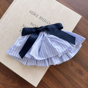 Blue and white striped ruffled hair clip with a large dark blue satin bow accessory